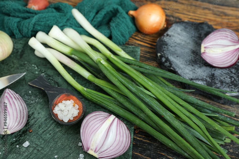 Boards with different kinds of onion and spices on brown wooden background Boards with different kinds of onion and spices on brown wooden background