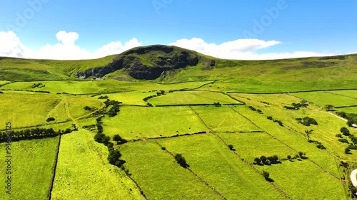 Drone Aerial view of the Beautiful Rolling hills of the coast of Ireland photo