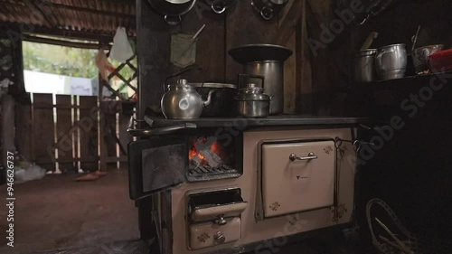 Panning inside movement about a traditional rural home kitchen oven, Argentina. photo