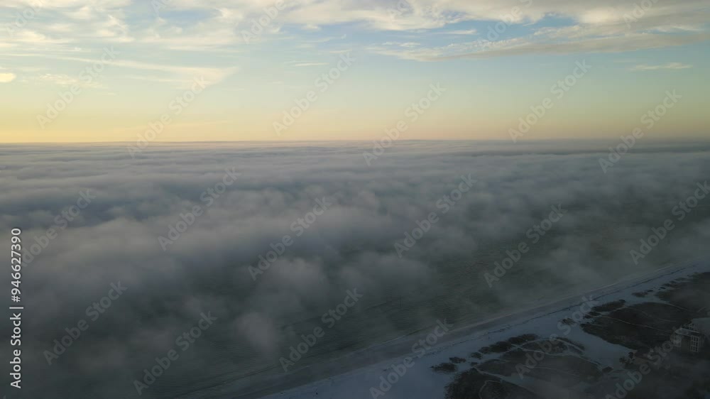 Drone slowly descending through clouds over beach at Sunset
In Florida Drone slowly descending through clouds over beach at Sunset
In Florida