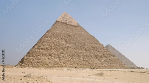 Giza Plateau Pyramid With Blue Sky Backdrop In Giza, Egypt. Static Shot