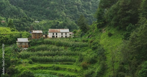 Chitlang village in Makwanpur showing vintage houses surrounded by farming fields and lush greenery. The scene reflects the serene and traditional farmer lifestyle of rural Nepal Drone shot photo