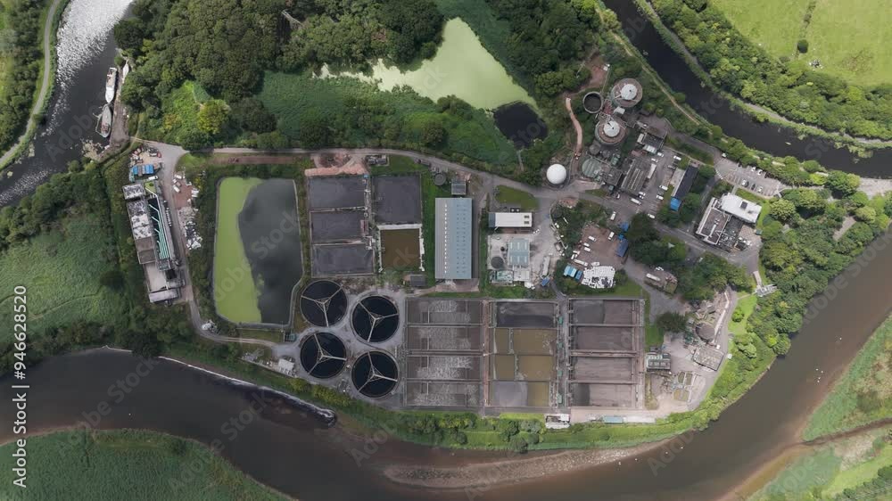 Top-down aerial view of a water treatment facility and its associated ...