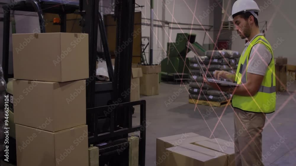 Warehouse worker using tablet, logistics data animation over boxes and forklift Warehouse worker using tablet, logistics data animation over boxes and forklift