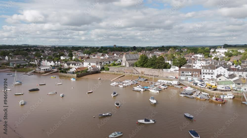 Aerial orbital view of the village of Topsham, highlighting the charming riverside scenery along the shores of the River Exe in Devon, UK Aerial orbital view of the village of Topsham, highlighting the charming riverside scenery along the shores of the River Exe in Devon, UK