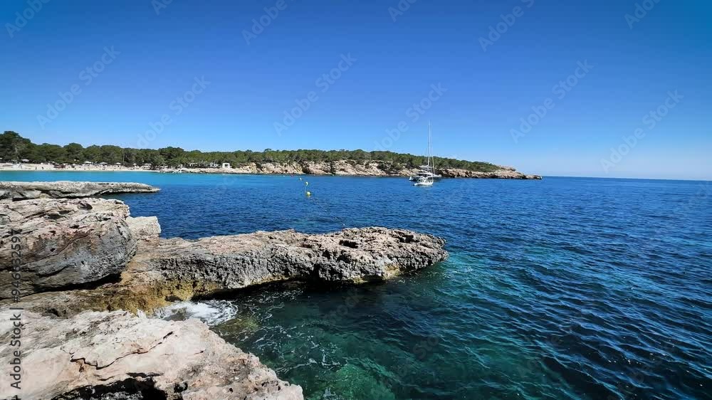 View from Rocky Shore of Cala Bassa Beach in Ibiza View from Rocky Shore of Cala Bassa Beach in Ibiza
