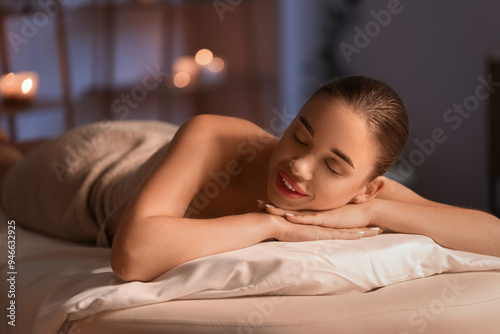 Pretty young woman in spa s...