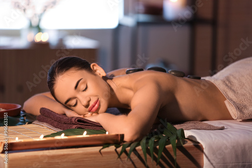 Pretty young woman in spa s...