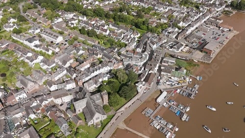 Aerial orbital fly-in of the Topsham waterfront, highlighting the picturesque views along the River Exe, UK photo