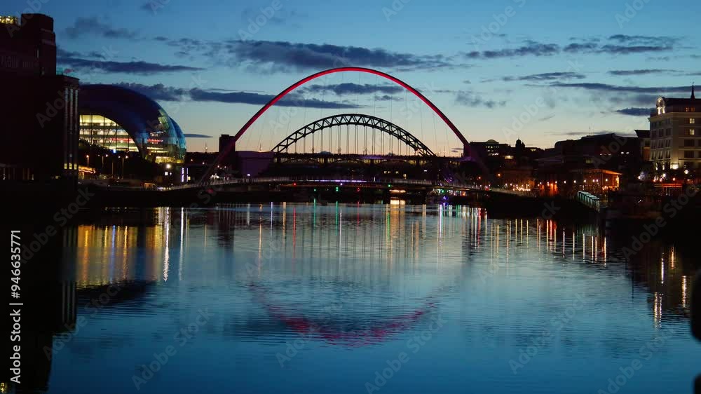 Newcastle upon Tyne, night view of the city quayside with famous bridges over the river. England UK