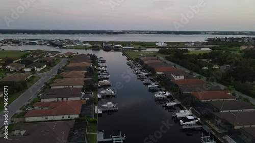 Waterfront coastal homes in Manatee county in Palmetto, Florida with private slips, docks for homeowner boats photo