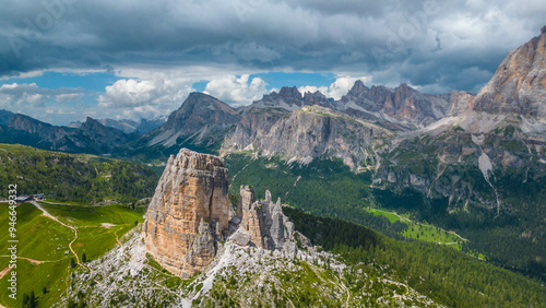 An aerial view of the incredible Cinque Torri mountains in the Dolomites, Italy, captured by a drone. This breathtaking shot showcases the dramatic rock formations and rugged beauty of  mountains photo