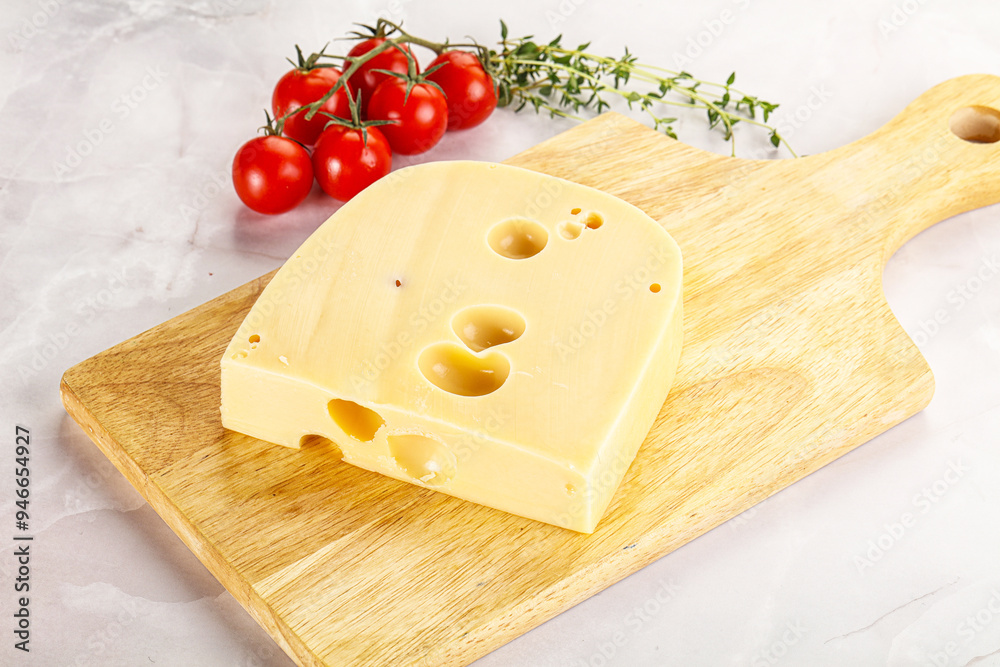 Maasdam cheese brick over board Maasdam cheese brick over board