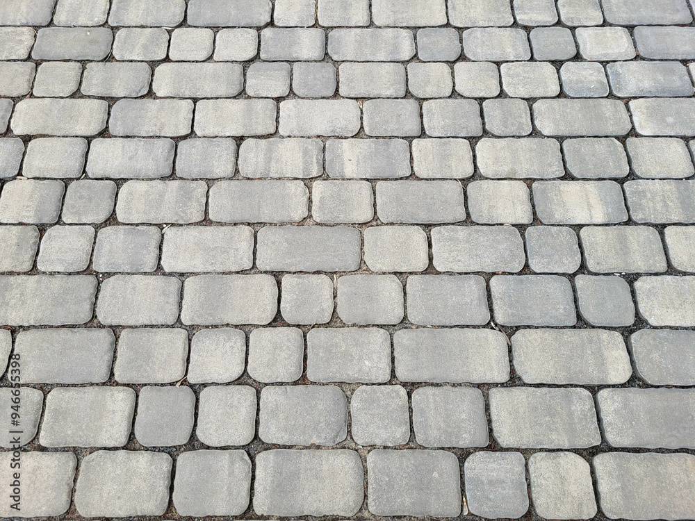 Perspective grey paving slabs stretching into the distance. Perspective grey paving slabs stretching into the distance.