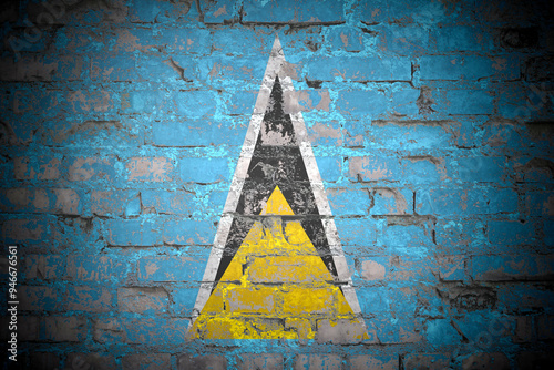 Flag of Saint Lucia on brick wall photo