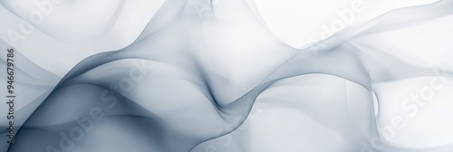 Abstract background featuring delicate, flowing white and gray fabric swirls. The smooth, ethereal texture creates a sense of movement and fluidity, symbolizing grace, elegance, and the passage of tim