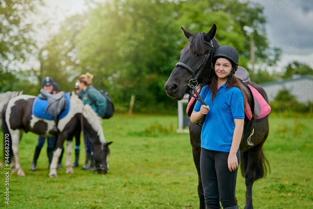 Obraz premium Girl, horse and development in nature for equestrian, portrait and learning with bonding or connection. Teenager, animal and pet outdoor for riding, care and fitness with smile, exercise and helmet