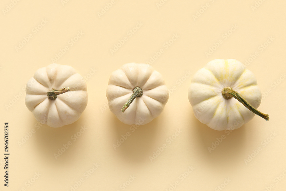 Fresh white pumpkins on color background Fresh white pumpkins on color background
