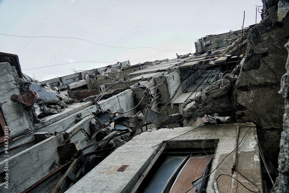 Destroyed apartment buildings due to war and shelling with rockets and artillery Destroyed apartment buildings due to war and shelling with rockets and artillery