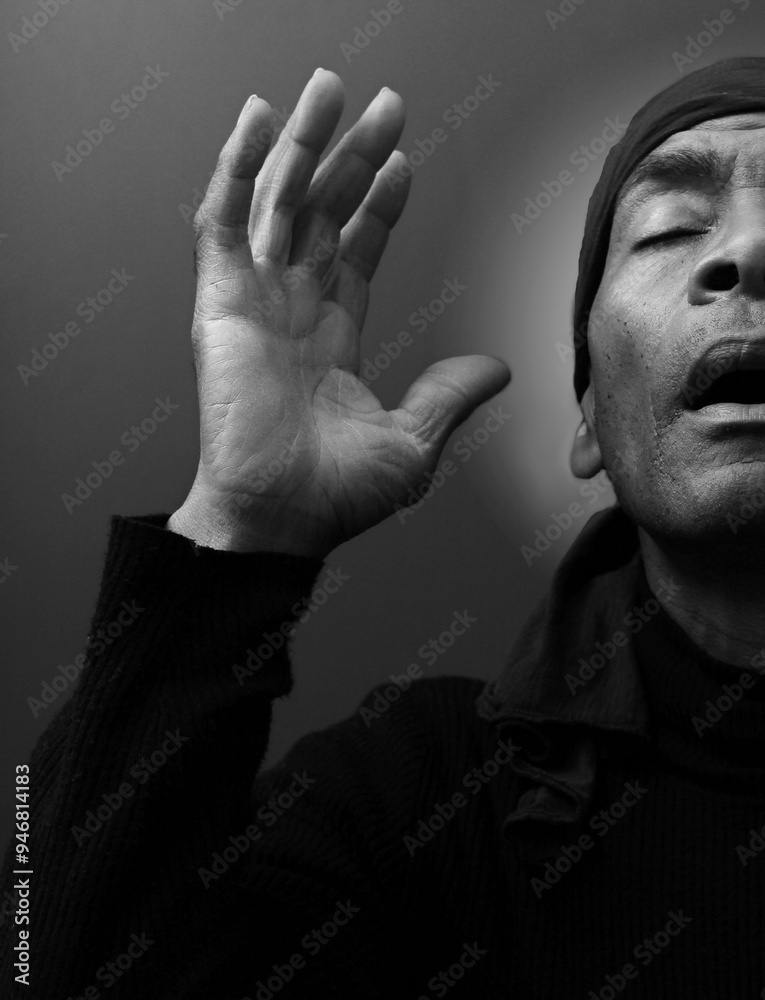 man praying to god with hands together Caribbean man praying on black background with people stock photos stock photo stock image man praying to god with hands together Caribbean man praying on black background with people stock photos stock photo stock image