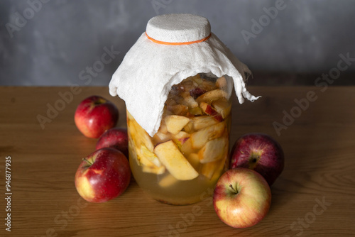 Apple cider vinegar. Creating apple vinegar, super healthy vinegar made of apple waste photo