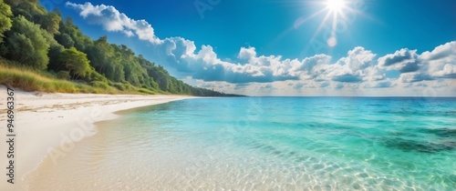 Tranquil Tropical Beach with Clear Turquoise Water and Lush Foliage