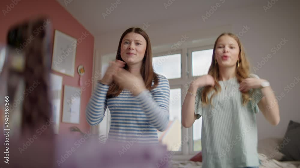 Cheerful Teenagers Dancing And Filming Their Moves In Bedroom Cheerful Teenagers Dancing And Filming Their Moves In Bedroom