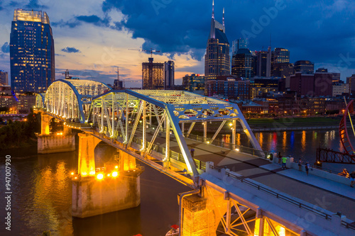 Photography The John Seigenthaler Pedestrian Bridge crossing the Cumberaland river and downtown Nashville at night