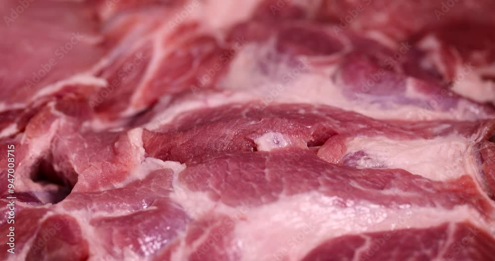 a sliced piece of pork meat from the neck, soft pork meat on a cutting board a sliced piece of pork meat from the neck, soft pork meat on a cutting board