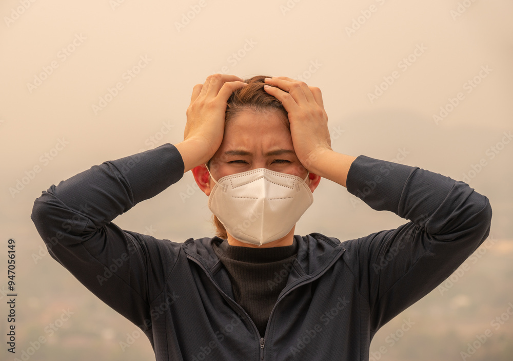 asian-woman-having-headache-becaused-of-by-bad-air-pollution-pm2-5