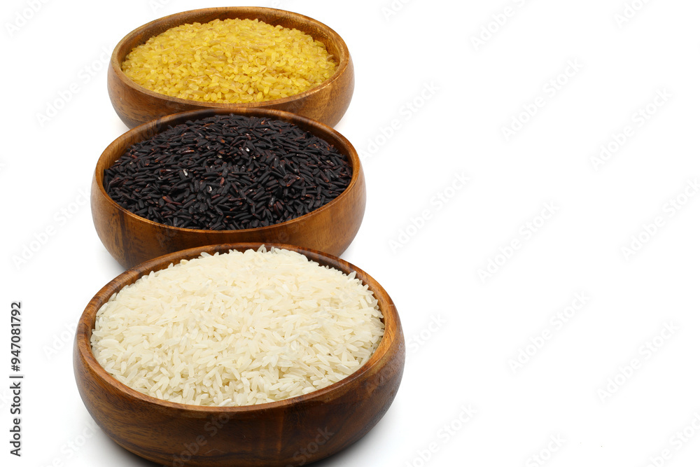 Different sorts of rice on isolated white background, flat lay. Space for text Different sorts of rice on isolated white background, flat lay. Space for text