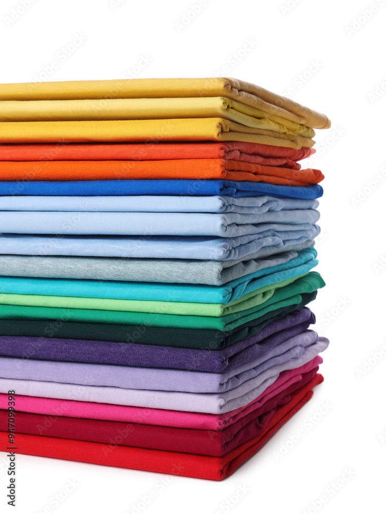 Stack of clean colorful t-shirts isolated on white Stack of clean colorful t-shirts isolated on white