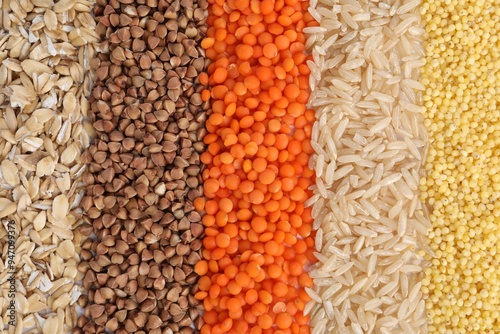 Different grains and cereals as background, top view