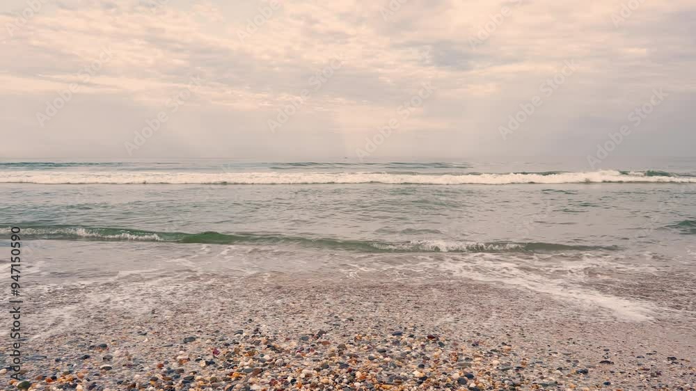 Ocean sea wave breaking wave on shore on pebbles beach background. Ocean sea wave breaking wave on shore on pebbles beach background.