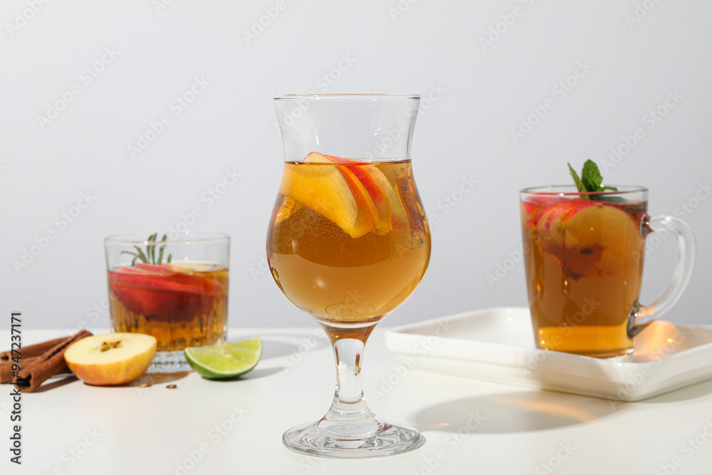 Glasses with apple cider on white background Glasses with apple cider on white background