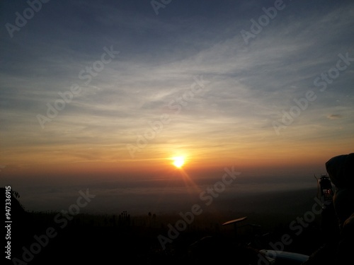 Beautiful sunrise with sindoro mountain view photo