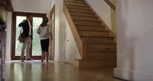 Man, greeting and home or woman child hug or running hallway, hello love after work. Male person, girl kid and wife embrace at front door for parenting arrive for happy family, bonding or welcome