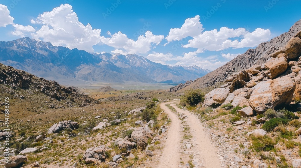 Scenic Mountain Road with Cloudy Sky and Valley View Scenic Mountain Road with Cloudy Sky and Valley View