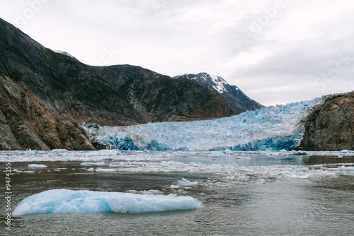 Sawyer glacier at the head of Tracy Arm fjjord in Alaska near Juneau during summer photo