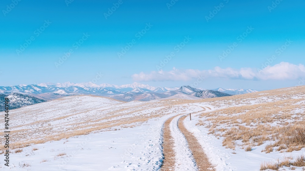Snowy Mountain Road with Blue Sky and Clouds Snowy Mountain Road with Blue Sky and Clouds