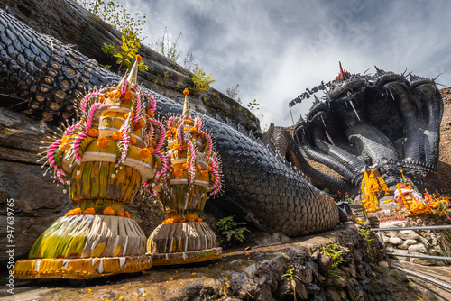 The big black serpent statue at Wat Phu Yod Ruay, Ubon Ratchathani, Thailand photo