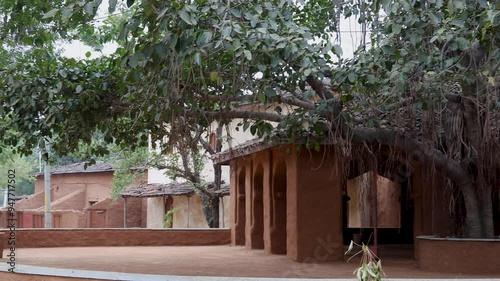 rural tribe traditional home made of bricks and wood in unique design at village at day
