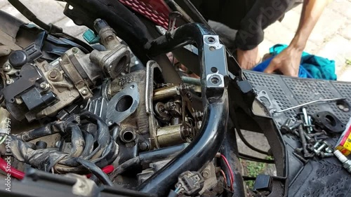 People Disassemble Metic Motorcycle Engine