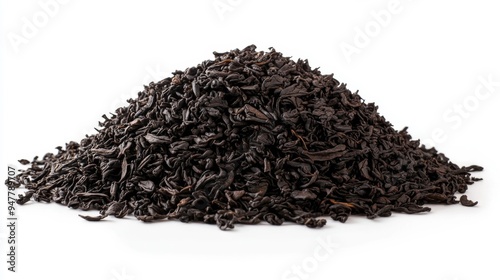 A Heap of High Quality Loose Black Tea Leaves isolated on a Pure White Background. Tea Brewing