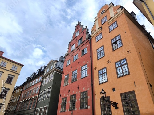 A street lined with colorful houses in Stockholm's historic Gamla Stan district, Sweden