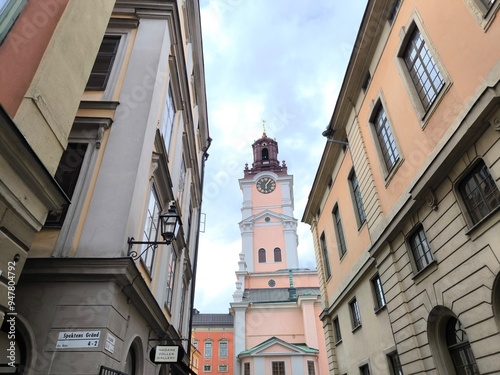 Photography A street lined with colorful houses in Stockholm's historic Gamla Stan district,