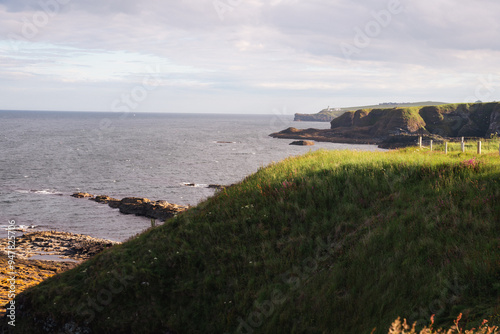 Fowlsheugh Cliffs Viewpoint. Scotland, United Kingdom. Highlands of Scotland. Lighthouse at the background of the picture.