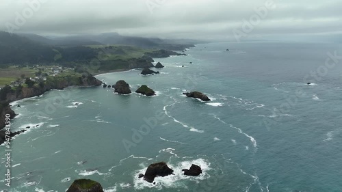 Aerial view of rugged coastline with dramatic waves and scenic cliffs, Westport Union Landing State Beach, California, United States. photo