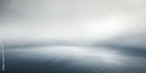 A neutral gray empty background with soft, diffuse lighting and no features.