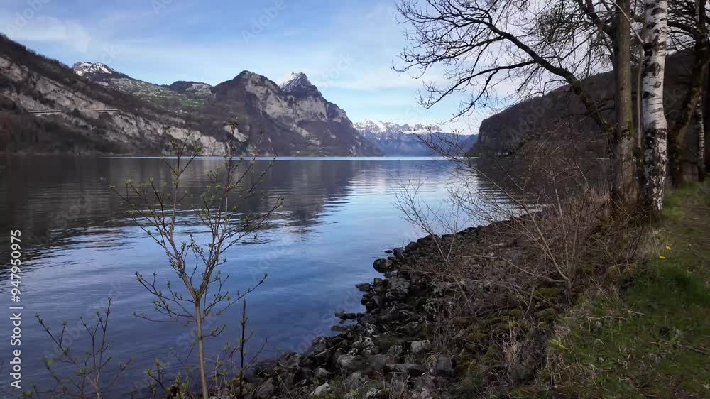 Lake Walensee, Swiss Alps mountains peak in Weesen St. gallen Switzerland Lake Walensee, Swiss Alps mountains peak in Weesen St. gallen Switzerland